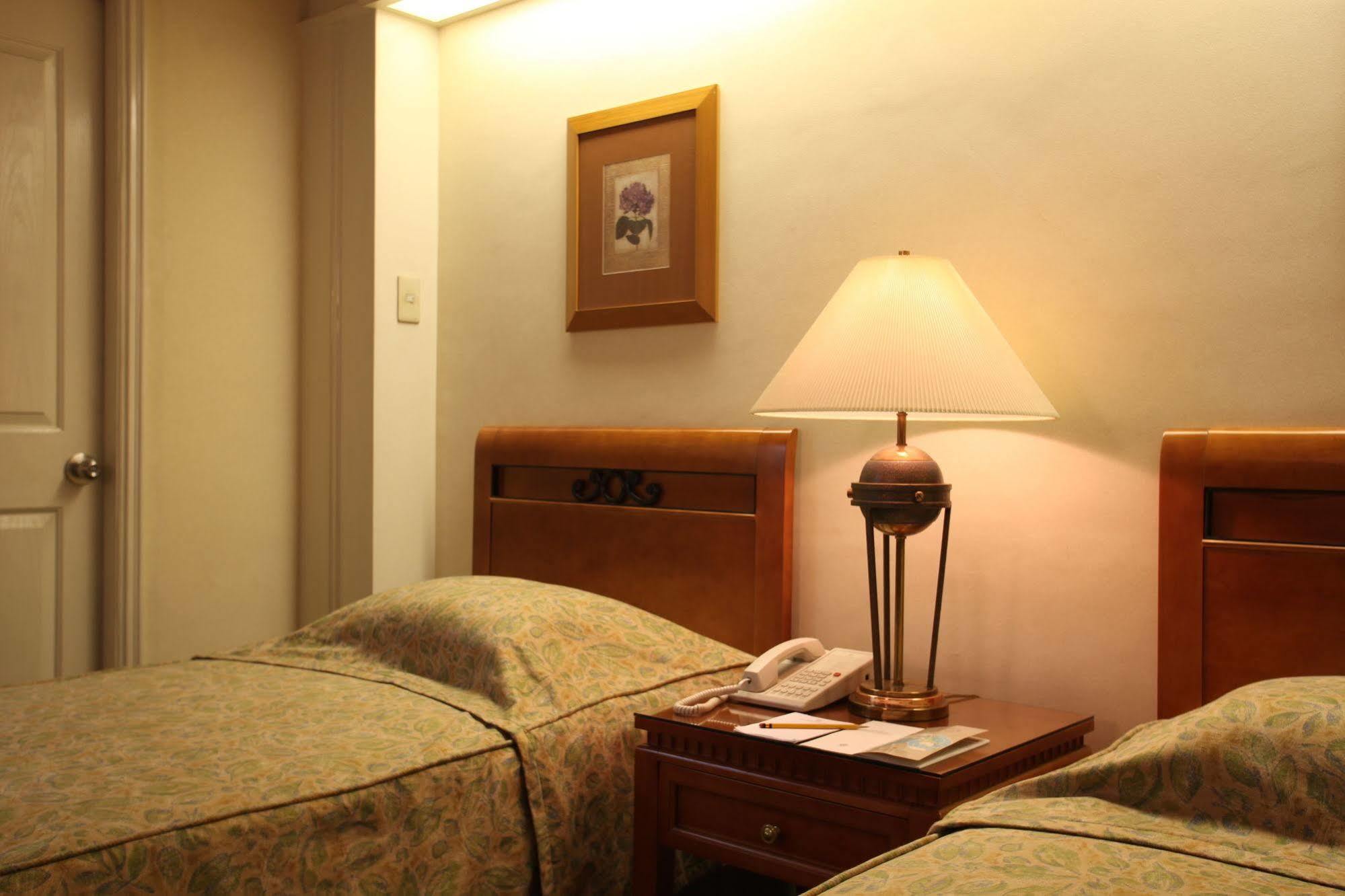 Sunny Bay Suites Manila Exterior foto
